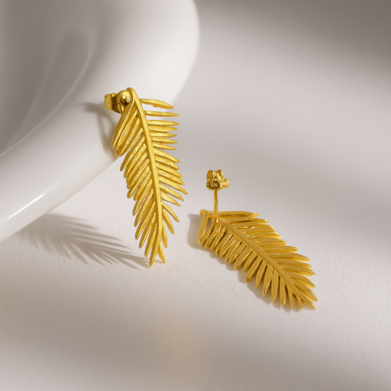 Golden Feather Earrings by VIKTAMNA