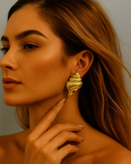 Golden Conch Statement Earrings by VIKTAMNA